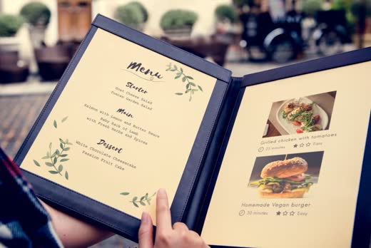Restaurant menu in a dark folder