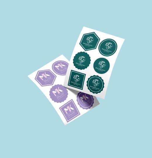 Sheet of green and purple round stickers