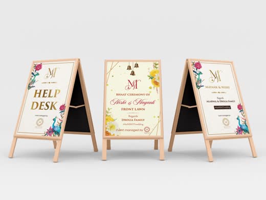 Three wooden easel standees for a wedding help desk